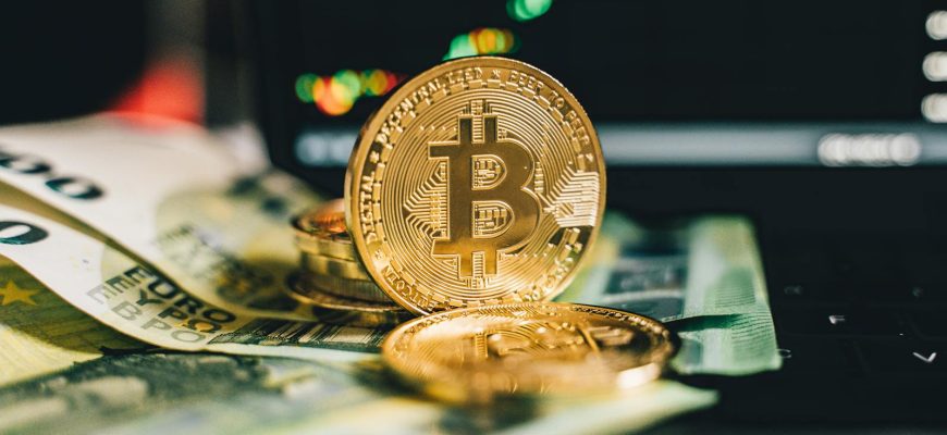 Close-up Shot of Paper Money and Gold Coins