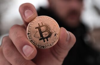 a person holding a coin