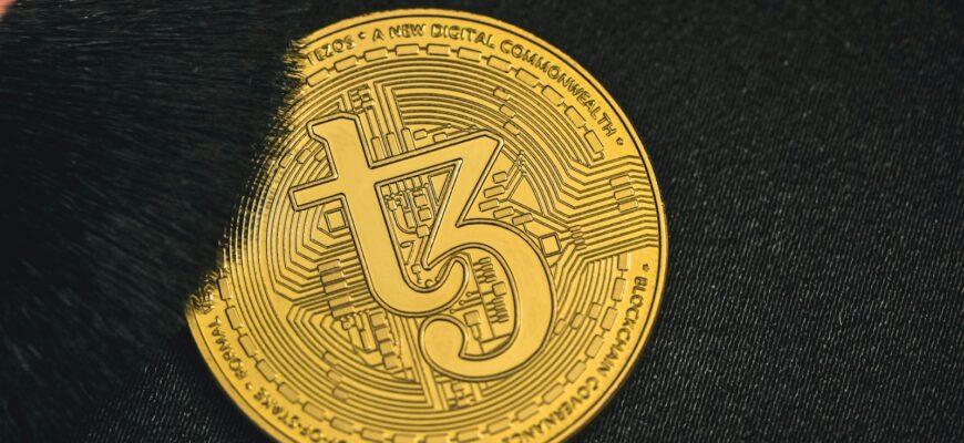 a close up of a coin on a black surface