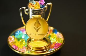 a gold plate with a cup and some candy on it