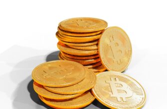 a pile of golden bitcoins sitting on top of each other