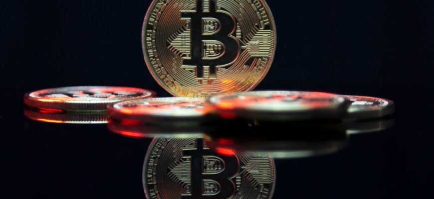 a bit coin sitting on top of a table