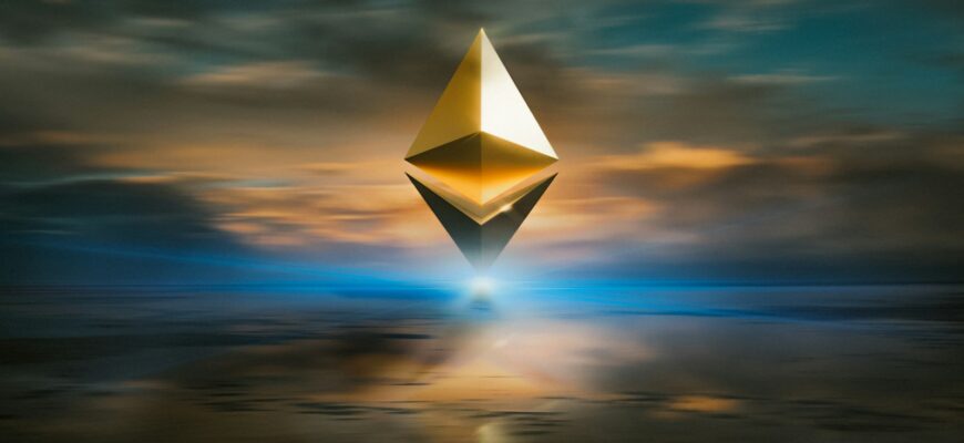 yellow and black triangular structure under cloudy sky during sunset