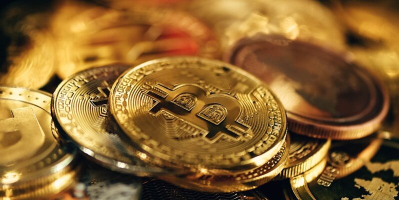 a pile of gold coins sitting on top of a table